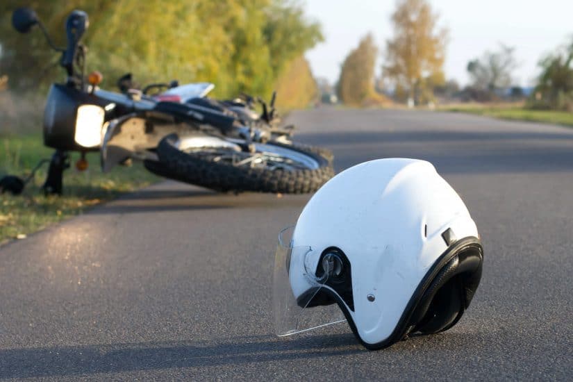 Motorcycle helmet on the road photo